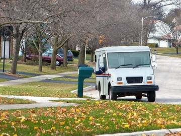 mail truck delivering mail